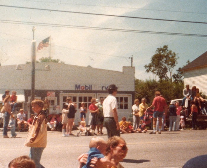 Harvey Haen's Mobil station during a 4th of July parade.